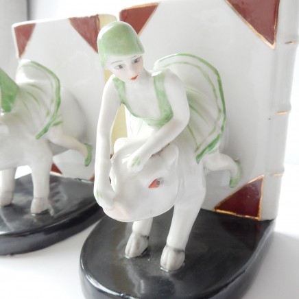 Photo of Art Deco Porcelain Ceramic Lady on Flying Pig Book Ends
