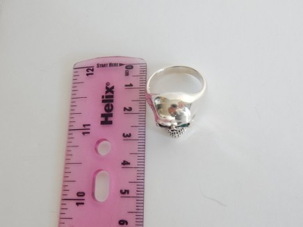 Photo of Solid Silver Green Skull Ring