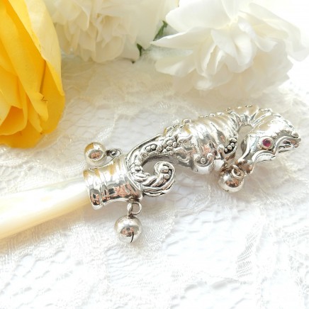 Photo of Solid Silver Pearl Ruby Seahorse Baby Rattle Christening Gift