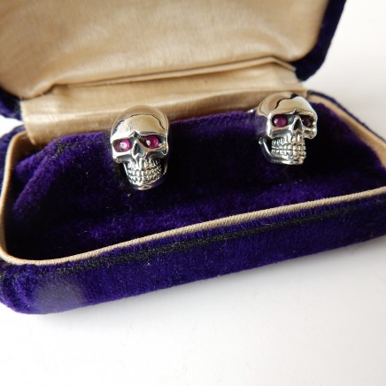 Photo of Sterling Silver Ruby Skull Stud Earrings