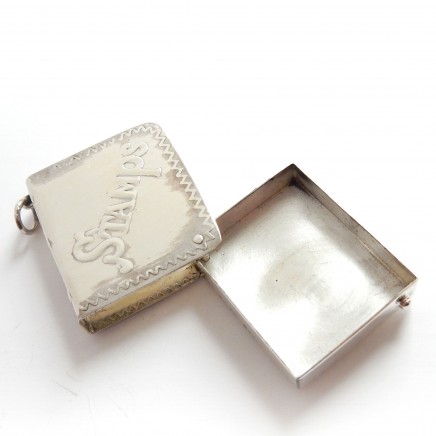 Photo of Vintage Sterling Silver Repousse Stamp Pendant Locket