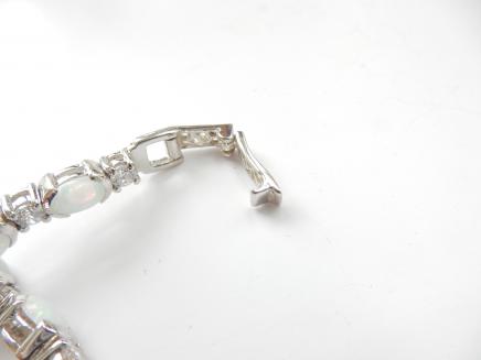 Photo of Delicate Sterling Silver & Opal Link Bracelet