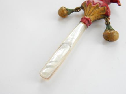 Photo of Hand Painted Brass Punch Baby Rattle