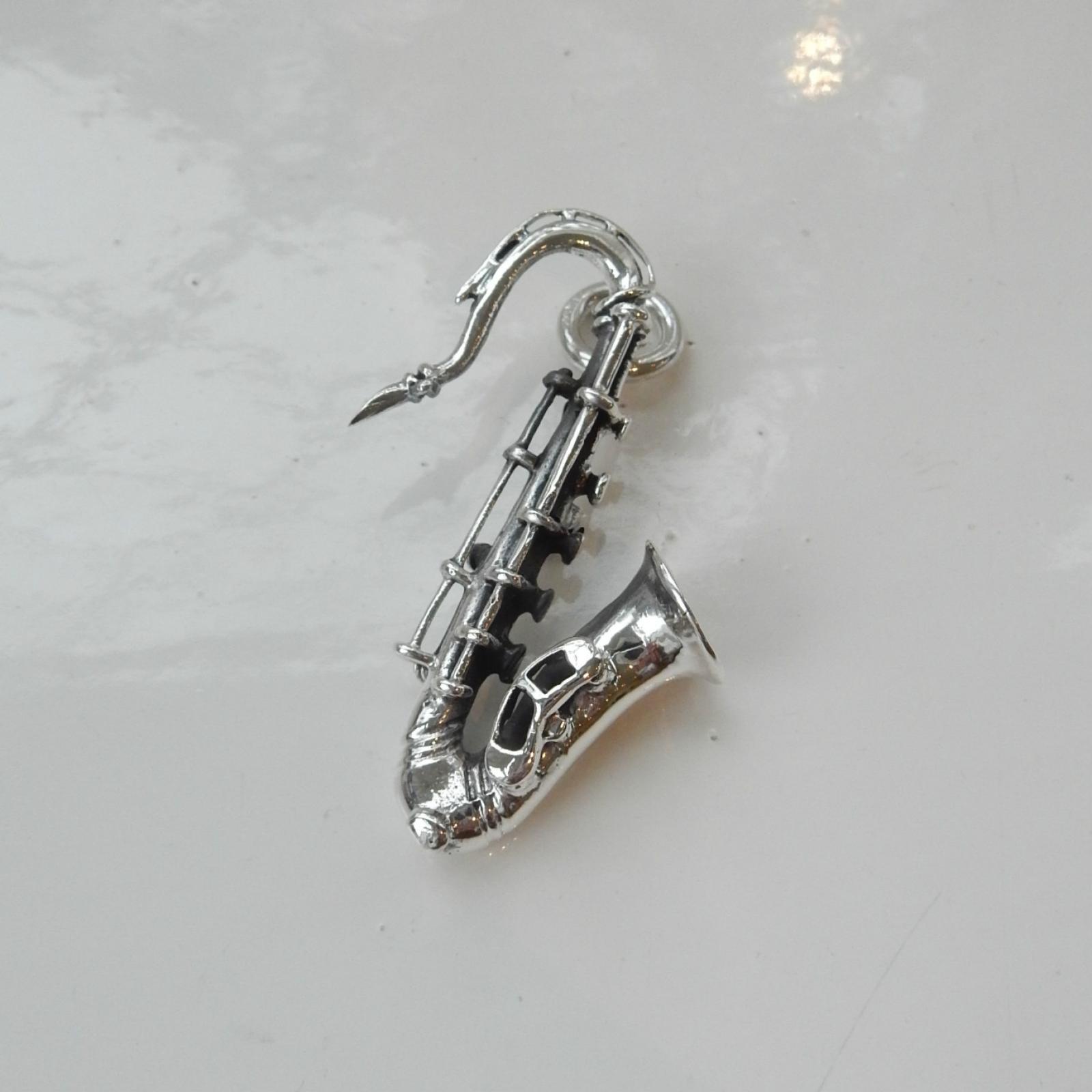 Photo of Solid Silver Trumpet Pendant