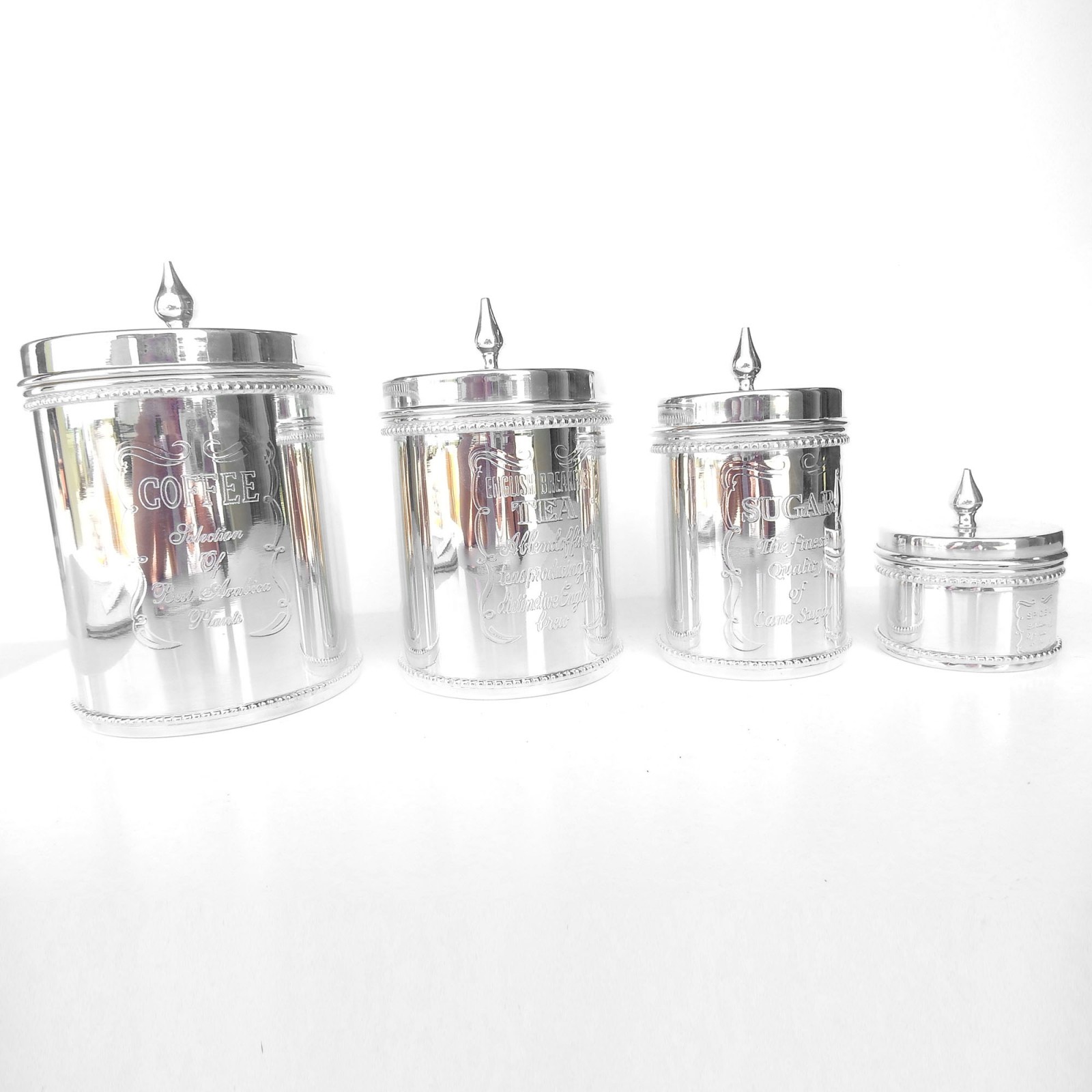white and silver tea coffee sugar canisters