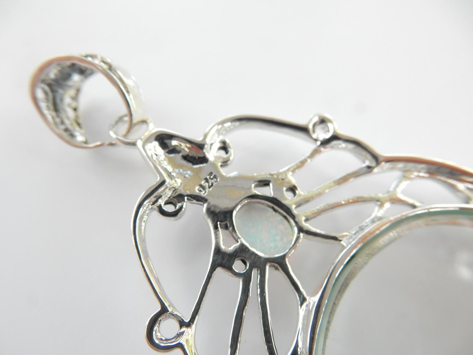 Photo of Silver & Opal Optical Glass Pendant